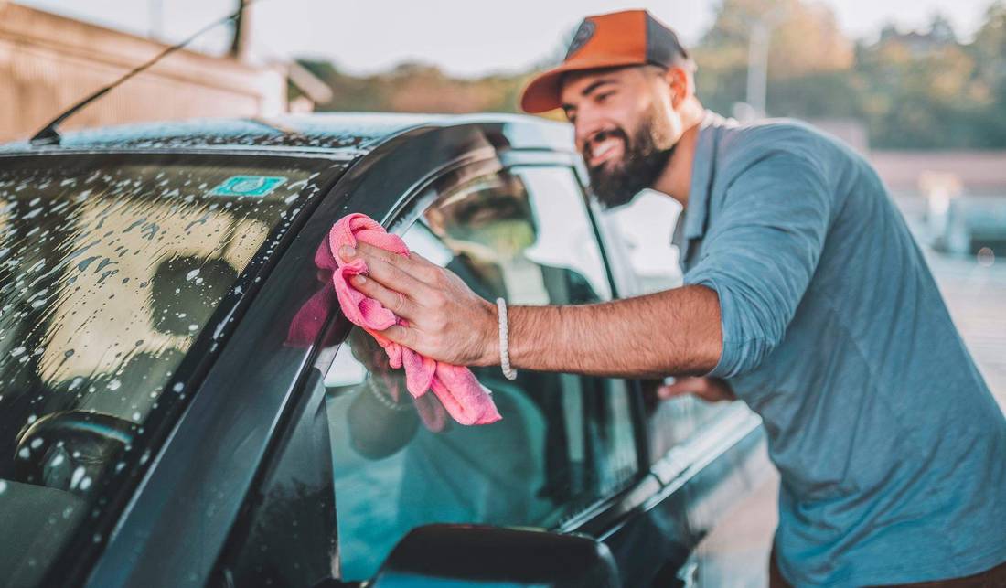 Man is washing the car